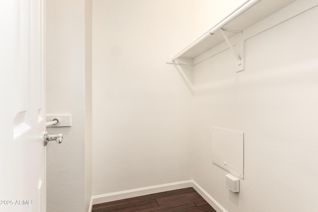 3633 N 3rd Ave Unit 2031, Phoenix, AZ 85013 - walk in closet with dark wood-type flooring