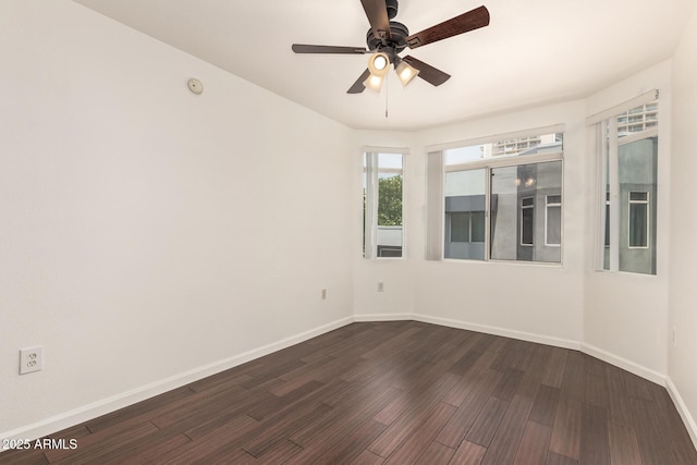 3633 N 3rd Ave Unit 2031, Phoenix, AZ 85013 - spare room with dark wood-style flooring and ceiling fan