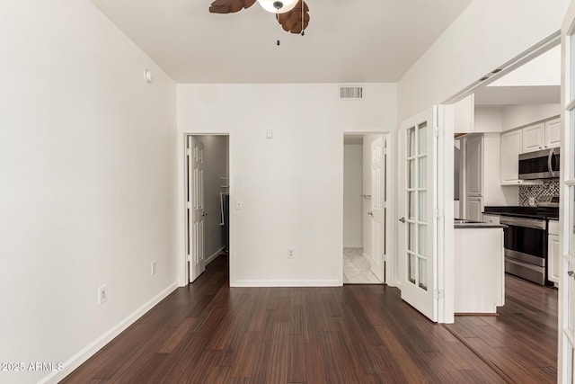3633 N 3rd Ave Unit 2031, Phoenix, AZ 85013 - unfurnished living room with a ceiling fan and dark wood finished floors