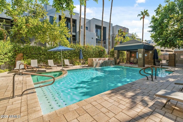 3633 N 3rd Ave Unit 2031, Phoenix, AZ 85013 - view of swimming pool with a patio area, a pool with connected hot tub, and a gazebo