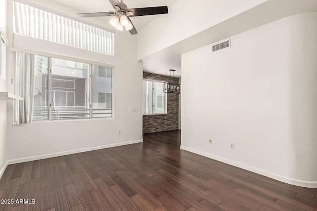 3633 N 3rd Ave Unit 2031, Phoenix, AZ 85013 - empty room featuring a ceiling fan and dark wood-style floors