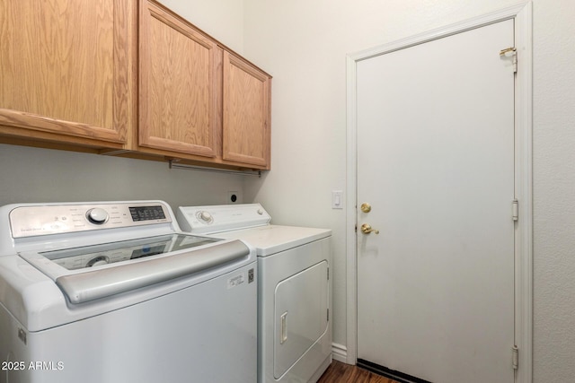 laundry area with cabinet space and washer and dryer