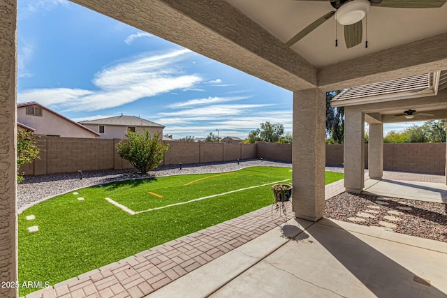 view of patio with a ceiling fan and a fenced backyard