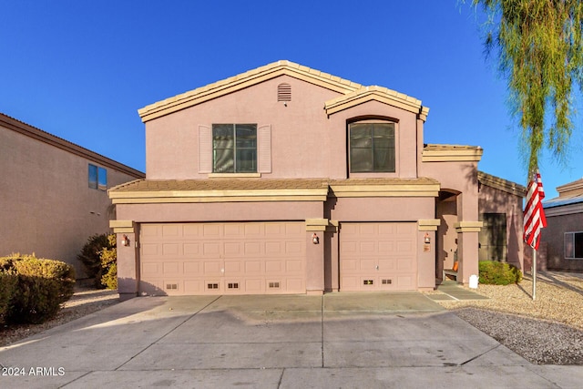 view of front property with a garage