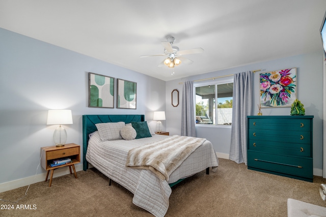 carpeted bedroom featuring ceiling fan