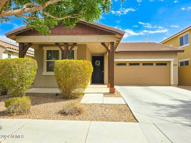 view of front of property with a garage