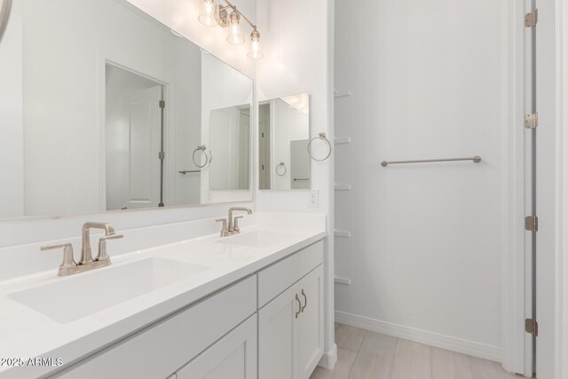 21640 E Roundup Way, Queen Creek, AZ 85142 - full bath with double vanity and baseboards