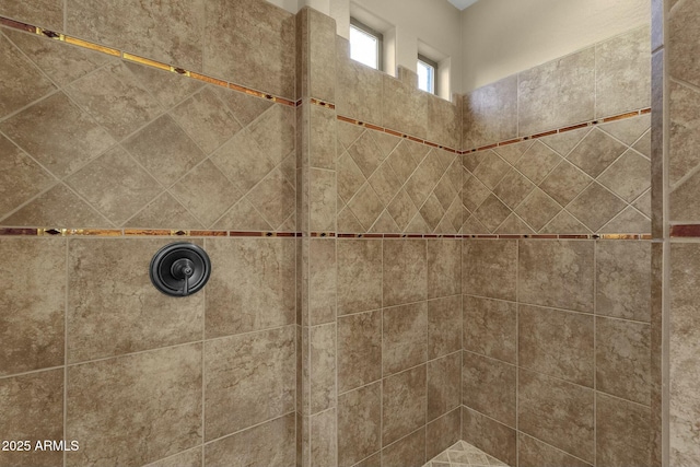 details featuring a tile shower