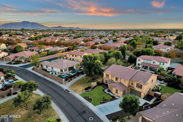 aerial view at dusk with a mountain view