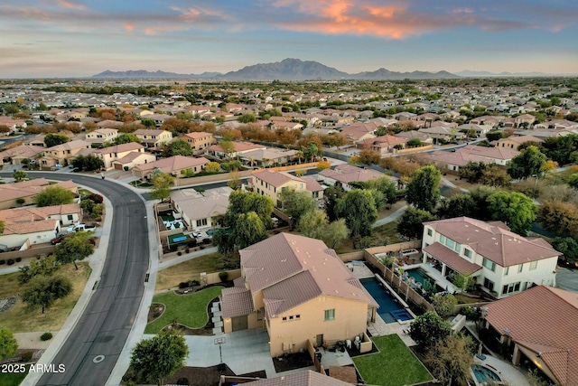 aerial view at dusk with a mountain view