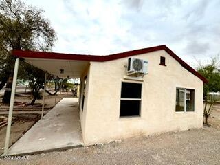 view of property exterior with ac unit