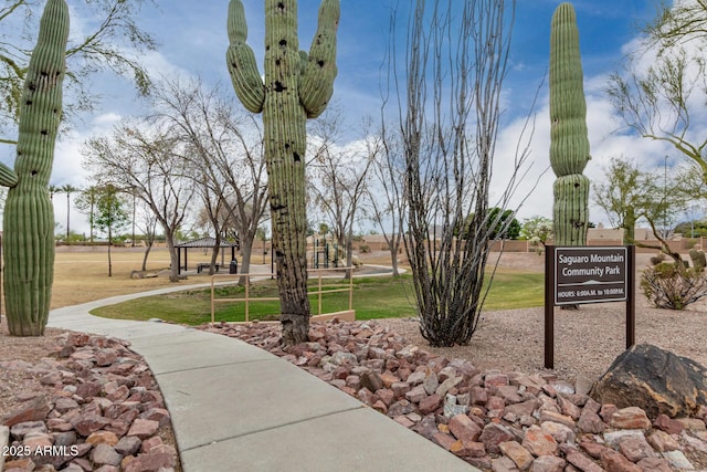 surrounding community with a gazebo and a yard