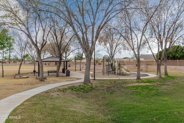 view of home's community with playground community, a yard, and a gazebo