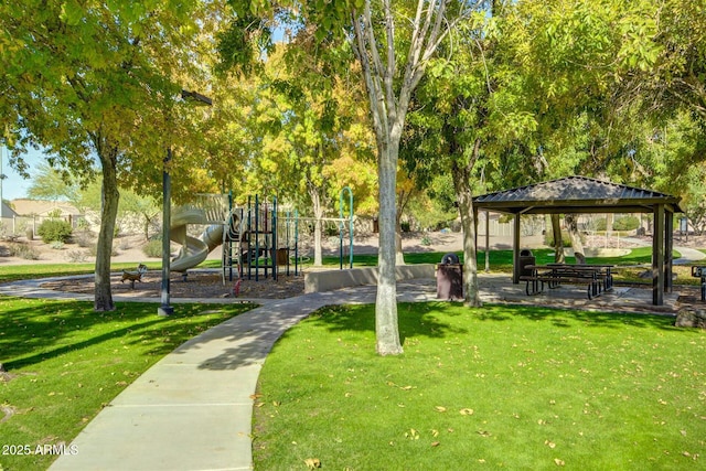 view of home's community with playground community, a lawn, and a gazebo