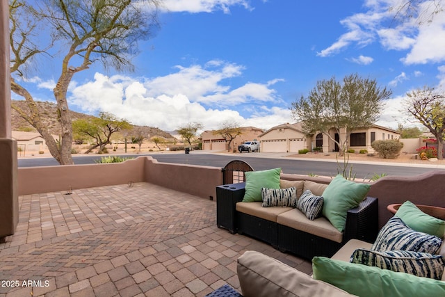 view of patio featuring a residential view and outdoor lounge area