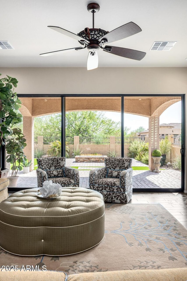 1822 N Waverly, Mesa, AZ 85207 - sitting room with healthy amount of natural light, wood finished floors, and ceiling fan
