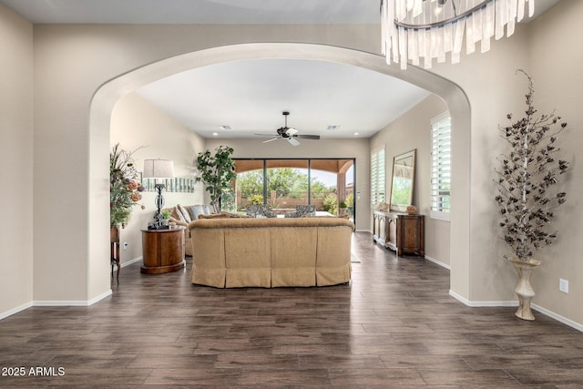 1822 N Waverly, Mesa, AZ 85207 - living room featuring a ceiling fan, dark wood finished floors, and arched walkways