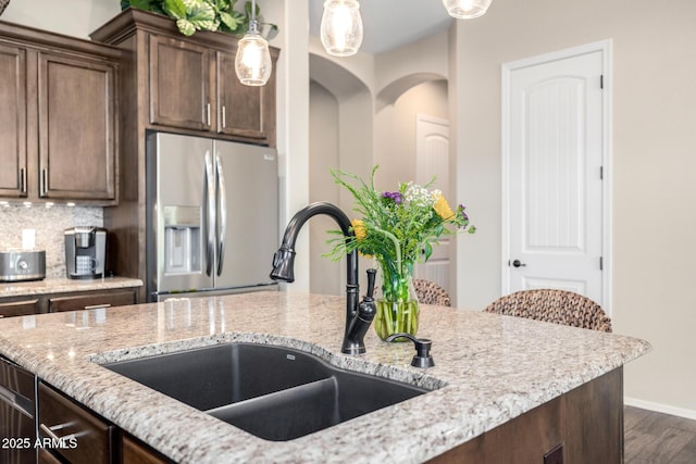 1822 N Waverly, Mesa, AZ 85207 - kitchen featuring stainless steel fridge, dark wood-style flooring, pendant lighting, and dark brown cabinetry