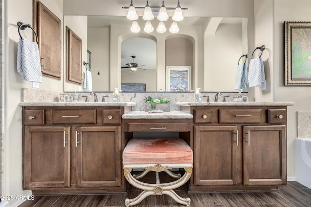1822 N Waverly, Mesa, AZ 85207 - bathroom featuring a ceiling fan, two vanities, and wood finished floors