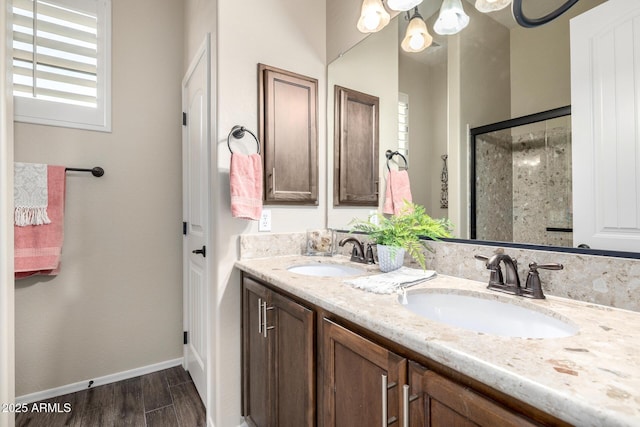 1822 N Waverly, Mesa, AZ 85207 - full bathroom featuring double vanity, a shower stall, wood finished floors, and plenty of natural light