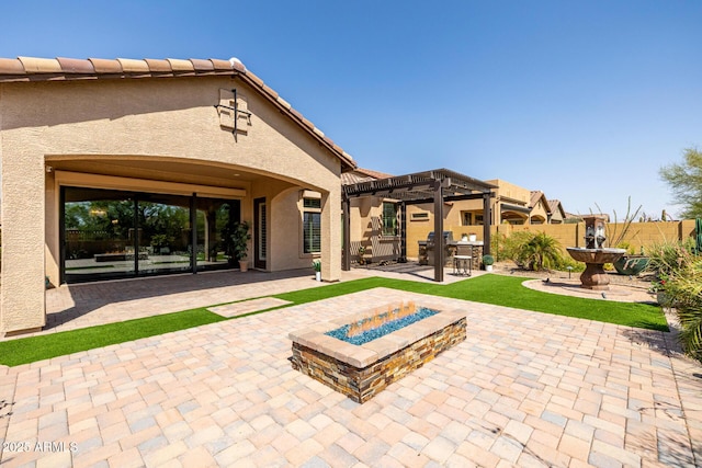 1822 N Waverly, Mesa, AZ 85207 - rear view of house featuring a patio area, a fire pit, a pergola, and stucco siding