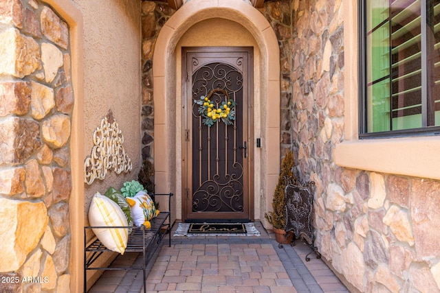 1822 N Waverly, Mesa, AZ 85207 - view of exterior entry featuring stone siding and stucco siding