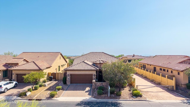 1822 N Waverly, Mesa, AZ 85207 - mediterranean / spanish house with an attached garage, stone siding, and stucco siding