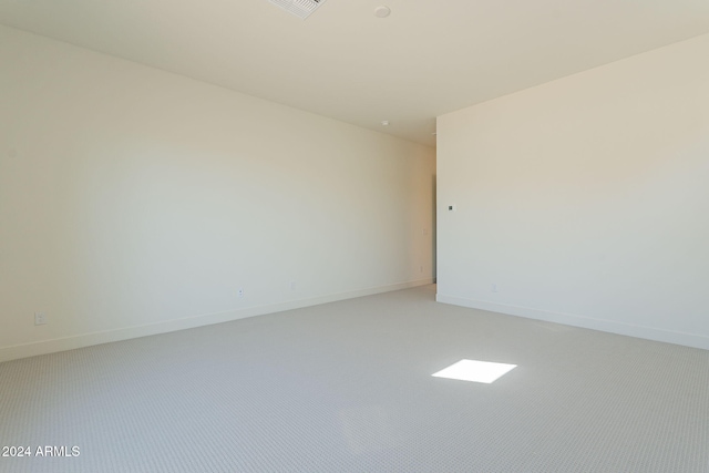 unfurnished room featuring carpet flooring