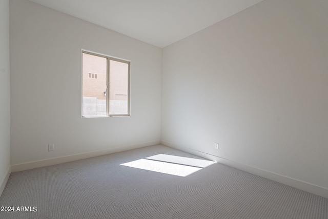 empty room featuring carpet floors