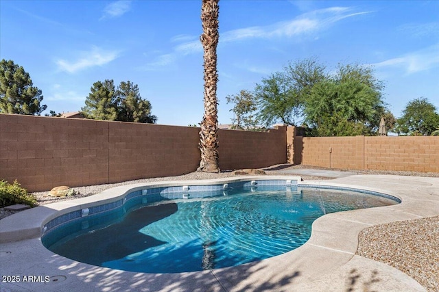 view of pool featuring a fenced backyard