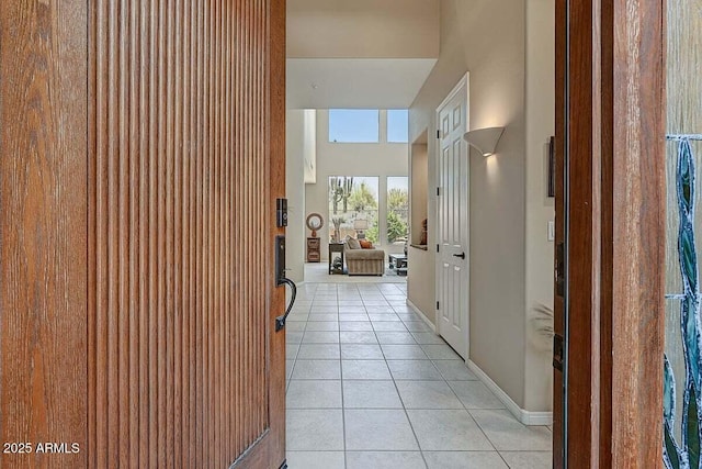27892 N 108th Way, Scottsdale, AZ 85262 - corridor with light tile patterned flooring, baseboards, and a high ceiling