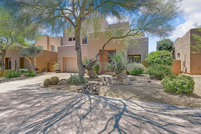 27892 N 108th Way, Scottsdale, AZ 85262 - southwest-style home featuring driveway, a garage, and stucco siding