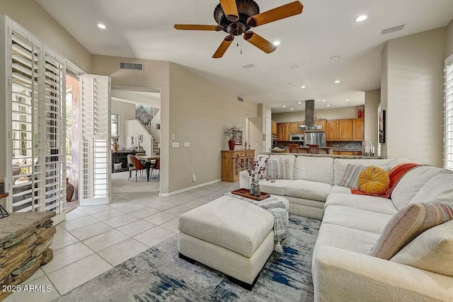 27892 N 108th Way, Scottsdale, AZ 85262 - living area featuring light tile patterned floors, ceiling fan, recessed lighting, and baseboards