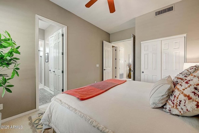 27892 N 108th Way, Scottsdale, AZ 85262 - carpeted bedroom with baseboards, ensuite bathroom, a ceiling fan, and a closet