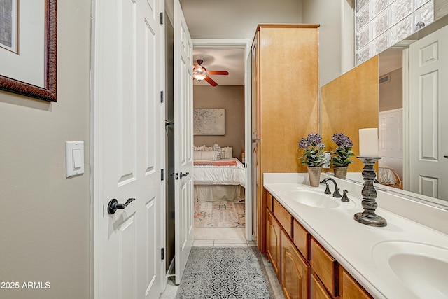 27892 N 108th Way, Scottsdale, AZ 85262 - bathroom with ensuite bathroom, double vanity, a ceiling fan, and tile patterned floors