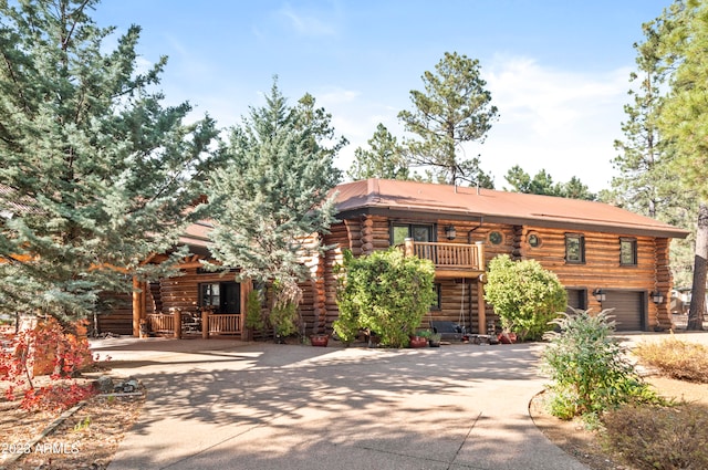 cabin featuring a garage