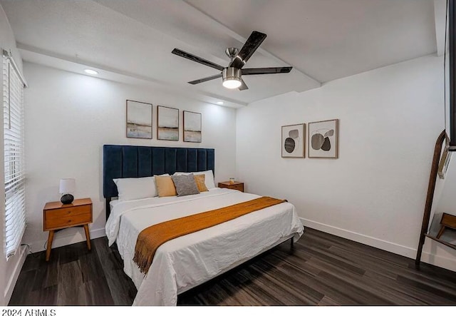 bedroom featuring ceiling fan and dark hardwood / wood-style floors