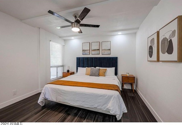 bedroom with ceiling fan and dark hardwood / wood-style floors