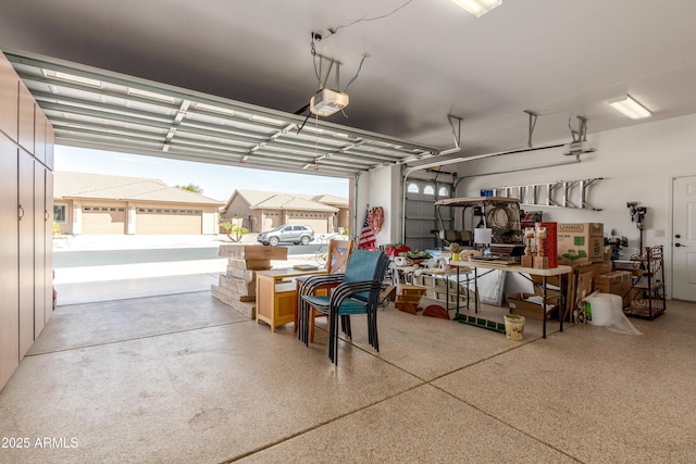 garage featuring a garage door opener