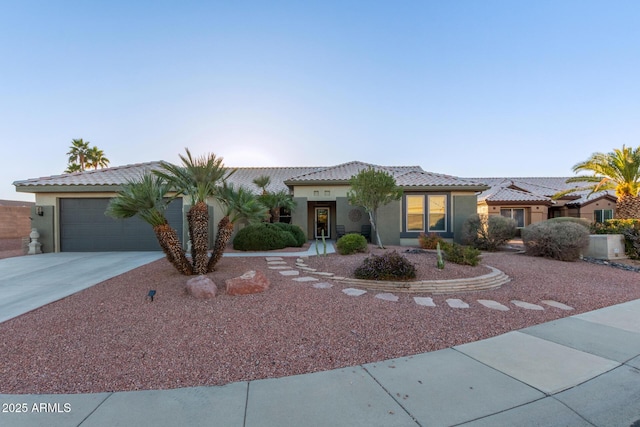 view of front of home with a garage