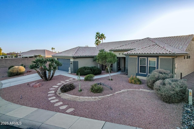 view of front of property with a garage