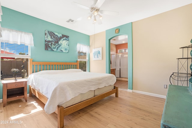 bedroom with hardwood / wood-style flooring and ceiling fan