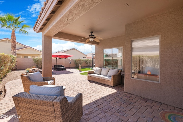 view of patio / terrace with outdoor lounge area and ceiling fan