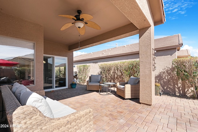 view of patio / terrace with ceiling fan and outdoor lounge area