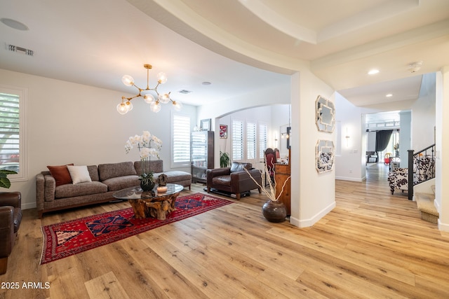 20639 W Grandview Dr, Buckeye, AZ 85396 - living area featuring a chandelier, light wood-style flooring, stairs, and recessed lighting
