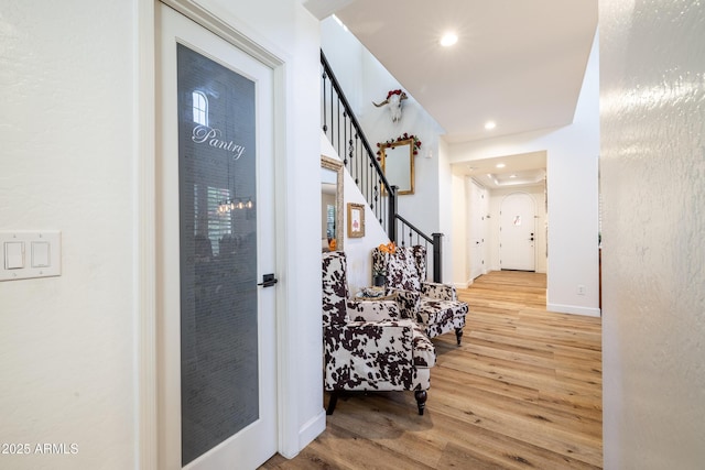 20639 W Grandview Dr, Buckeye, AZ 85396 - corridor with wood finished floors, recessed lighting, baseboards, and stairs
