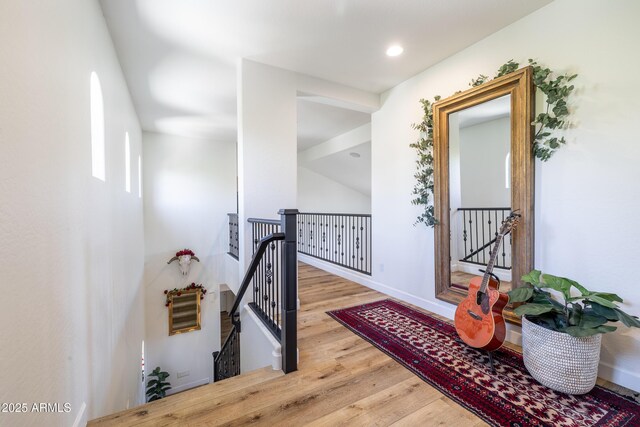 20639 W Grandview Dr, Buckeye, AZ 85396 - hallway with an upstairs landing, wood finished floors, recessed lighting, and baseboards