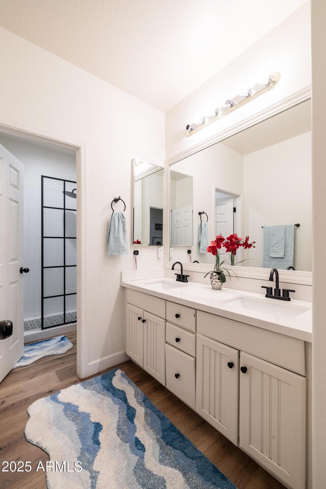 20639 W Grandview Dr, Buckeye, AZ 85396 - full bath with wood finished floors, a tile shower, and double vanity