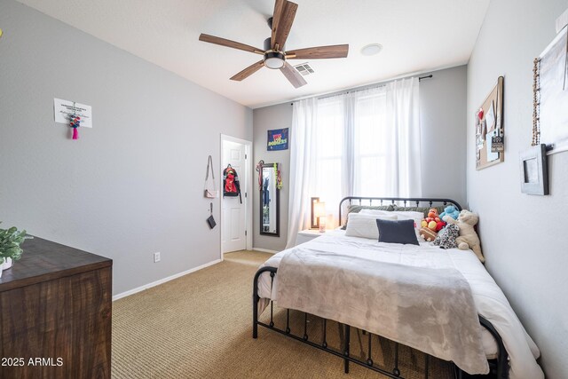 20639 W Grandview Dr, Buckeye, AZ 85396 - bedroom with light colored carpet, baseboards, and a ceiling fan