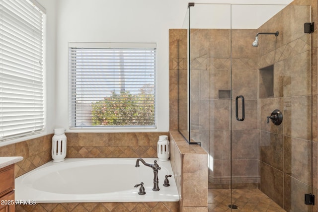 bathroom with vanity and plus walk in shower